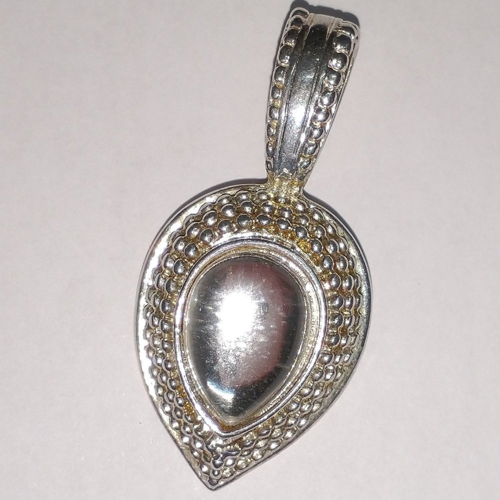 Silver toned teardrop slide